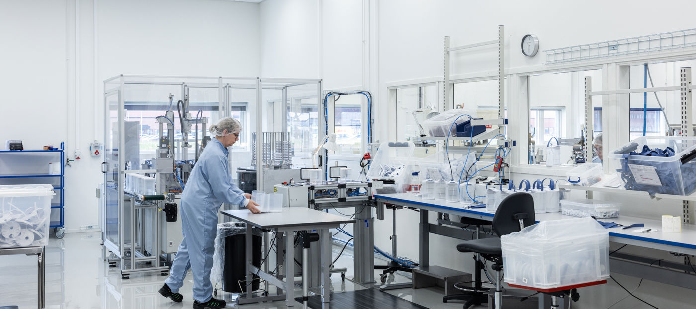 Person assembling in clean room